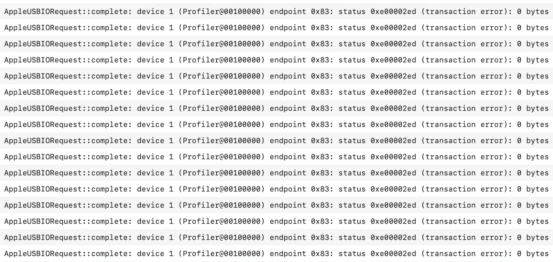 AppleUSBIORequest log entries for Profiler endpoint 0x83 report status 0xe00002ed, transaction error, with 0 bytes transferred